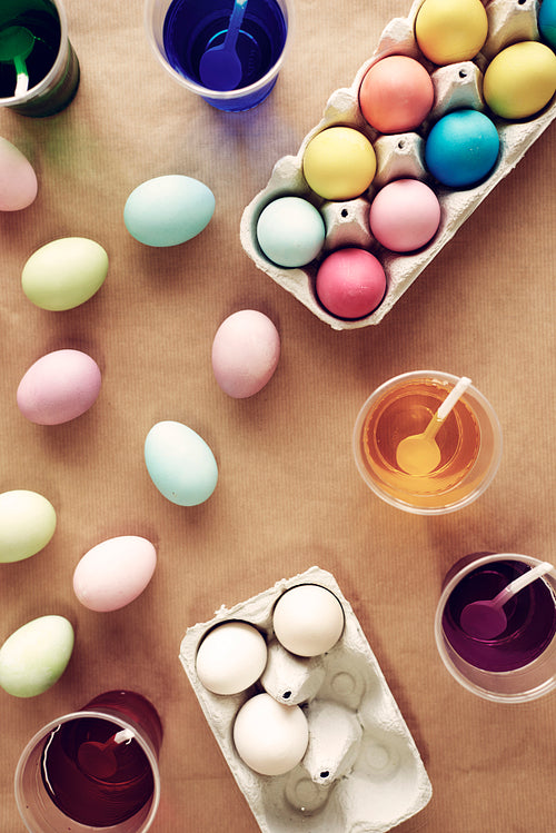 Shot of dyeing eggs at the table for Easter