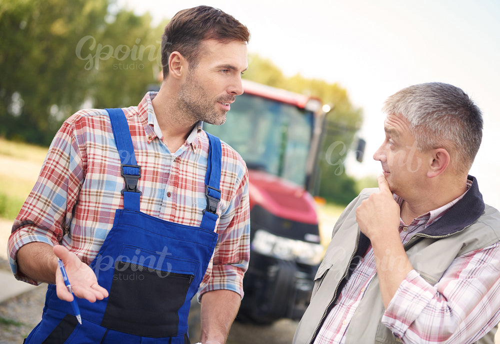Discussion between two modern farmers