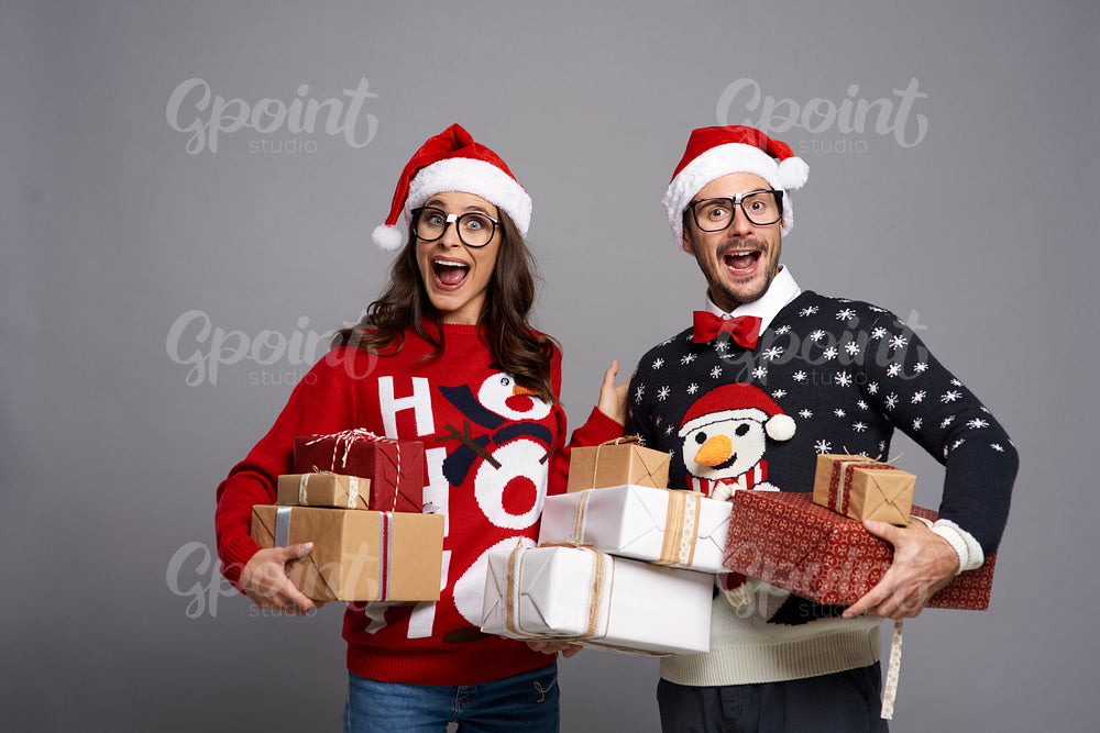 Couple shocked with so many Christmas presents