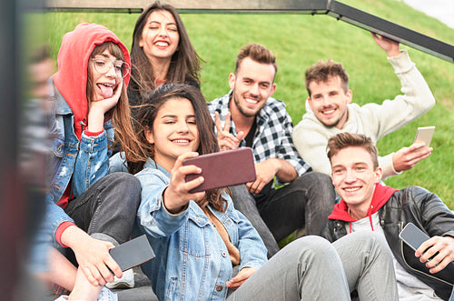 Group of friends making a selfie by mobile phone