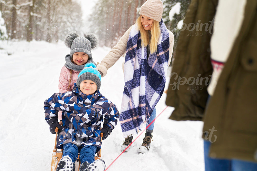 Family spending day outdoors at winter