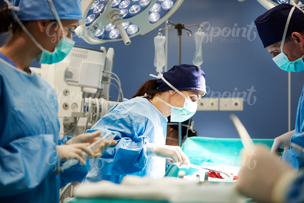 Surgeon using medical scissors during an operation