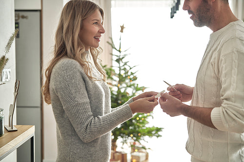 Caucasian couple make best wishes during Christmas Eve