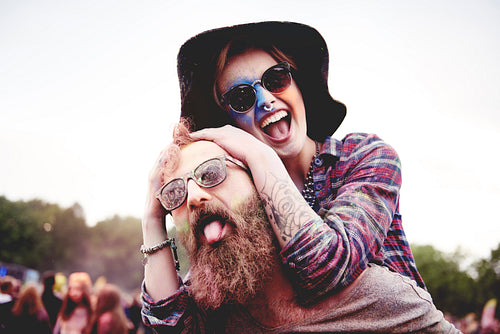 Happy couple at music festival