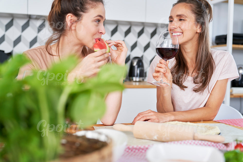 Girls chatting during meeting at home