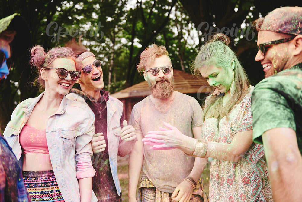 Friends are happy at the holi festival