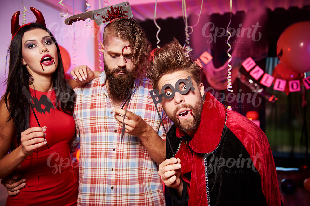 Three friends at the halloween party