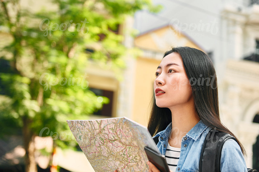 Vietnamese woman looking for her destination