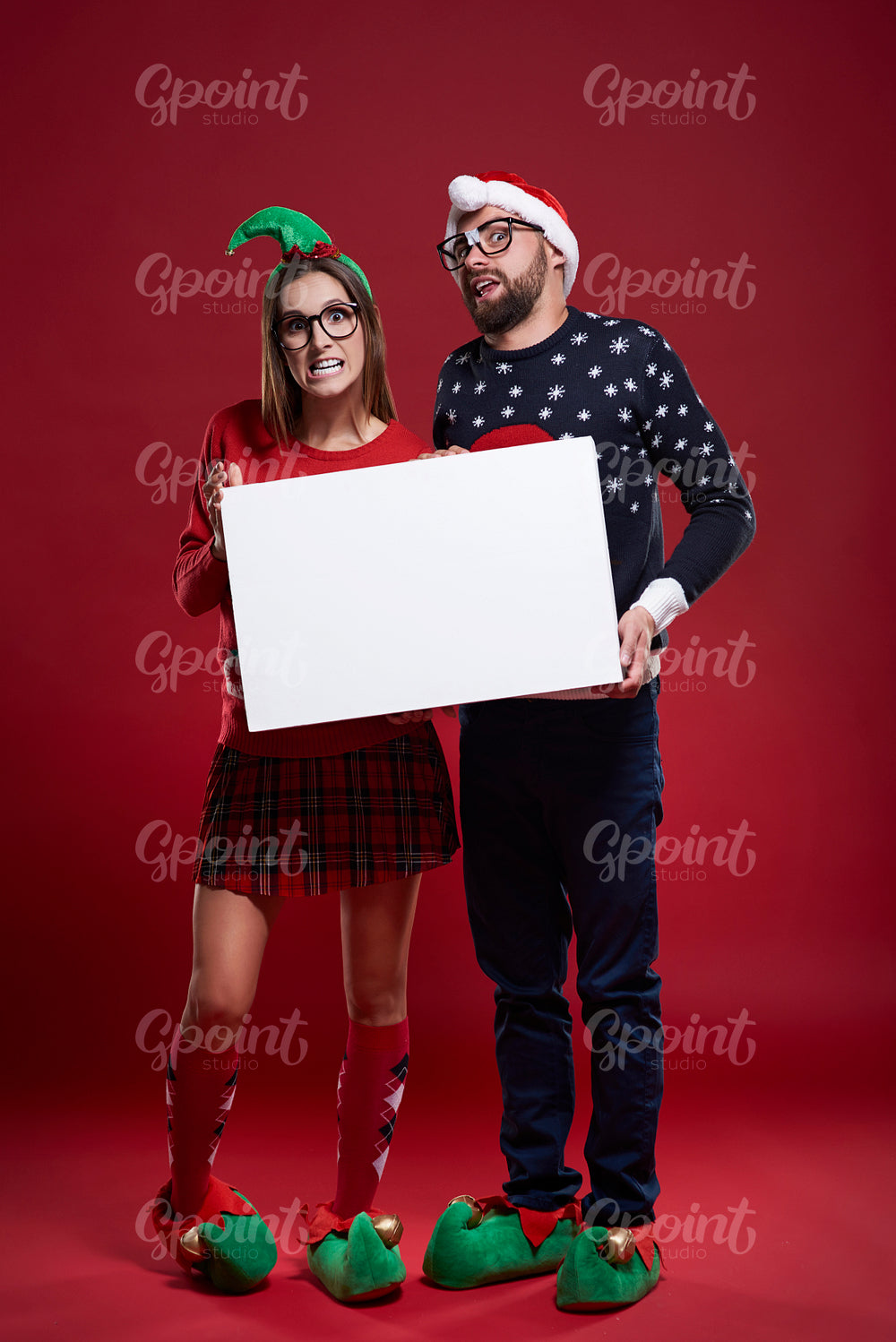 Empty placard and young couple
