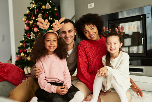 Portrait of happy family celebrating Christmas