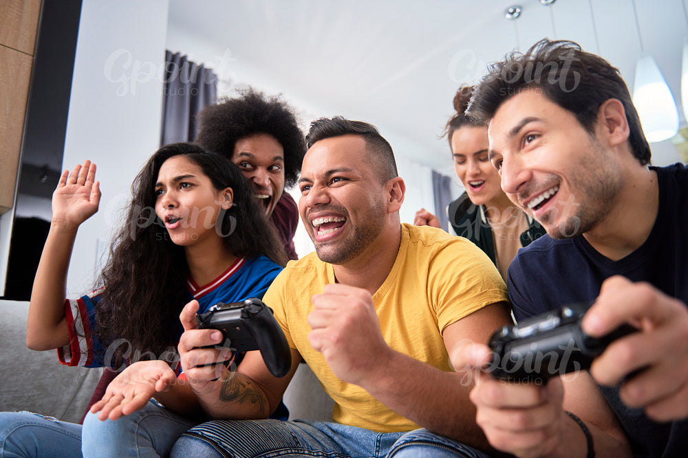 Friends have fun while playing on the game console