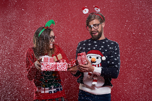 Christmas nerd couple with presents