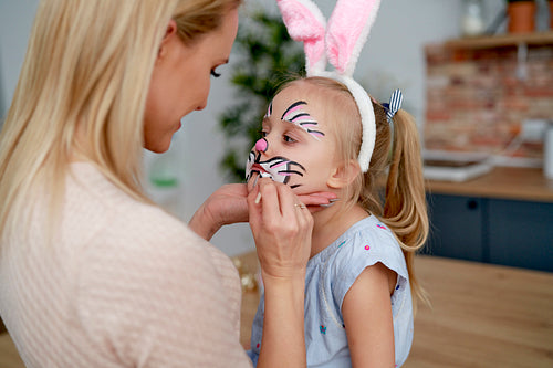 Face painting for little Easter bunny at home