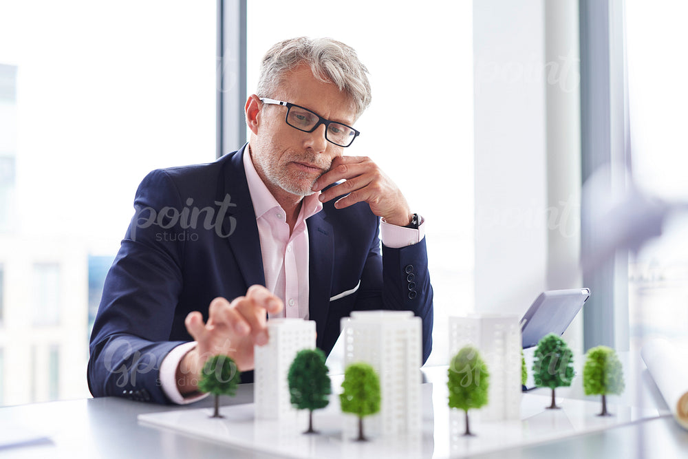 Busy businessman thinking about new solution