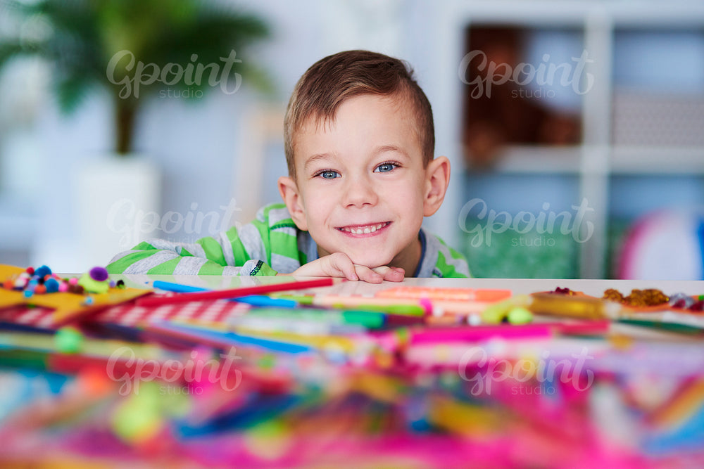 Portrait of happy preschooler with big smile on his face