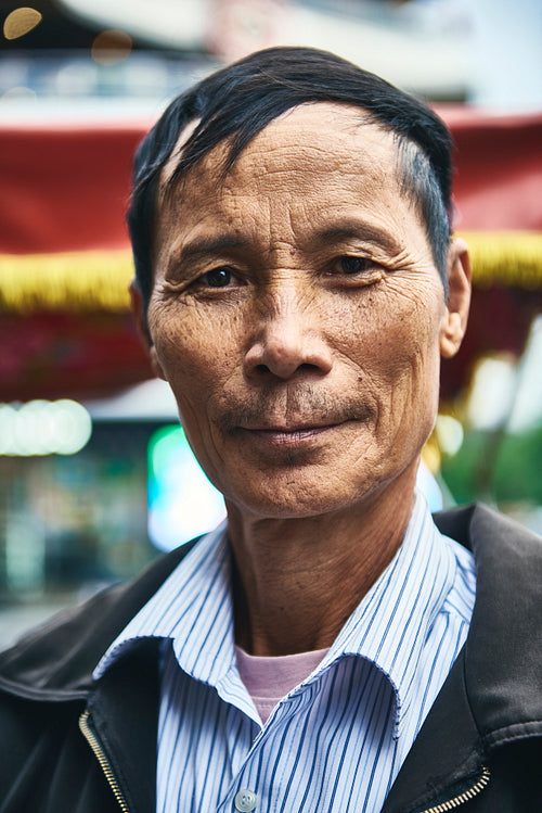 Vertical portrait of Vietnamese mature man