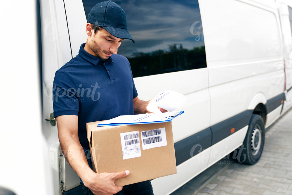 Courier checking the shipping address
