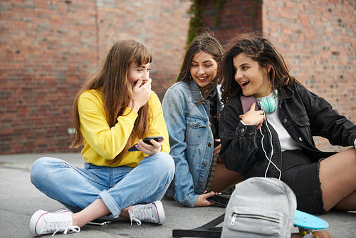 Three young women spending time together in the city
