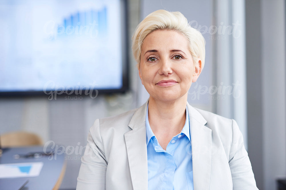 Portrait of mature businesswoman at work