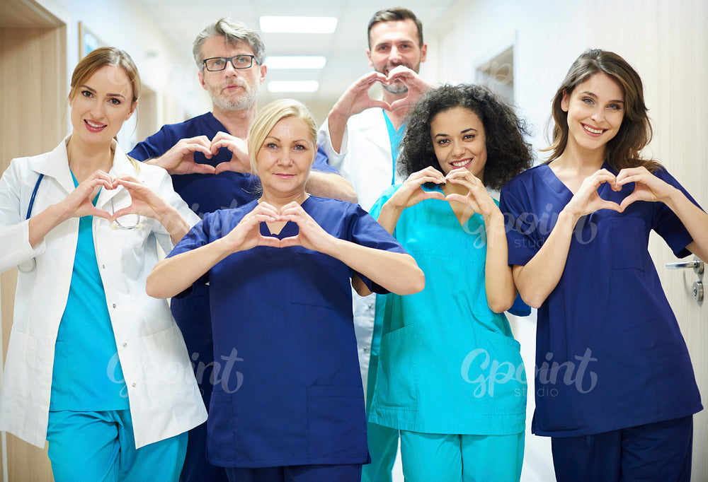 Group of doctors with heart symbol