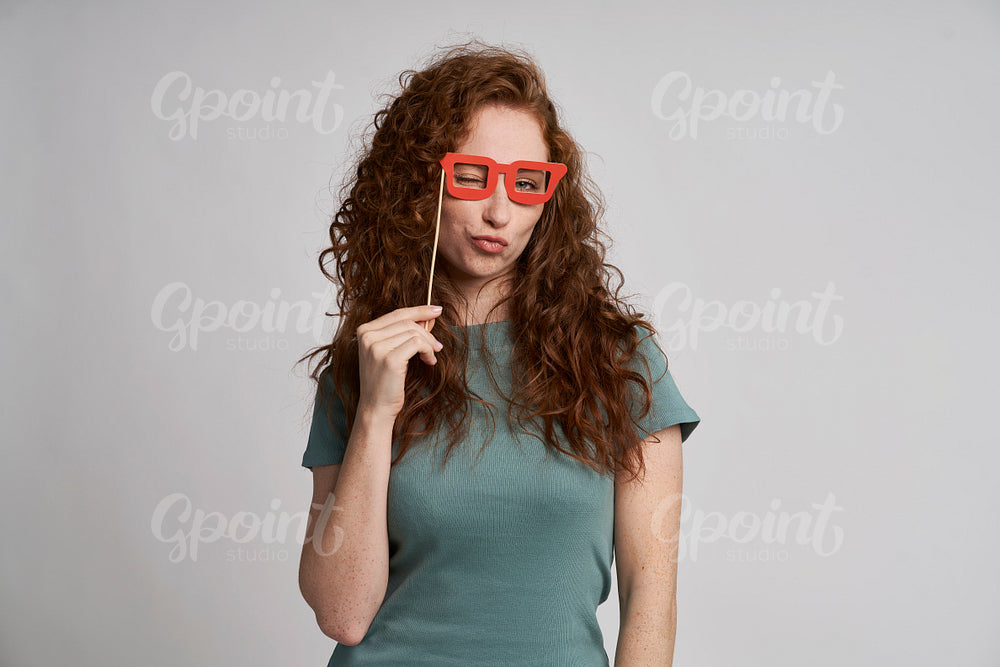 Young woman with funny glasses