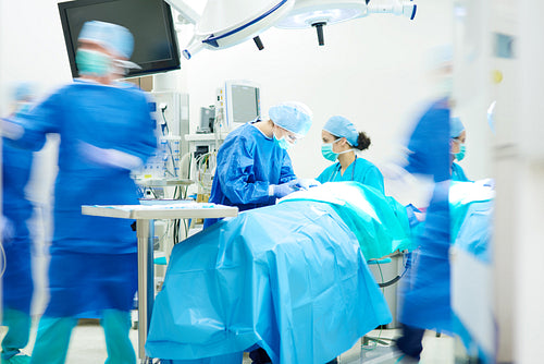 Surgeon team working together while operation