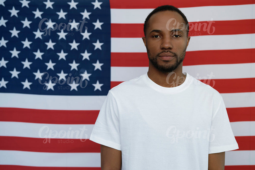 Portrait of black man on American flag background