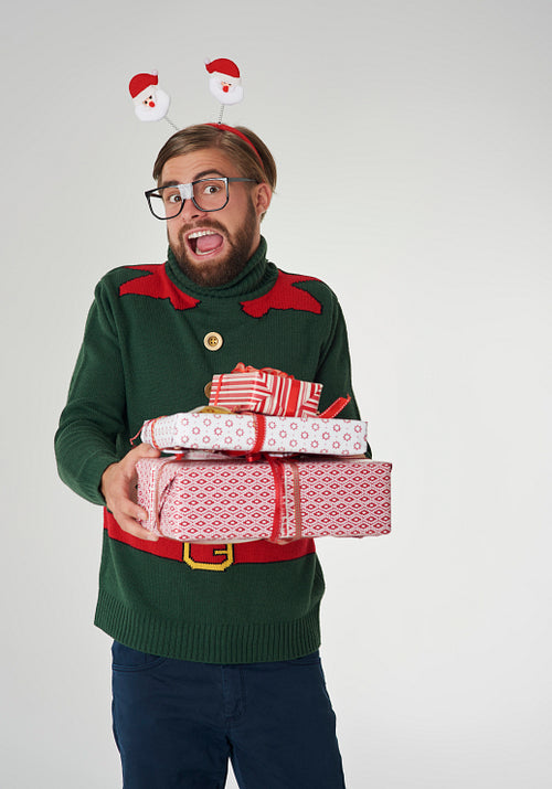 Man surprised with many Christmas gifts