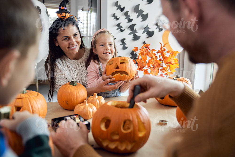Happy family preparing to Halloween 