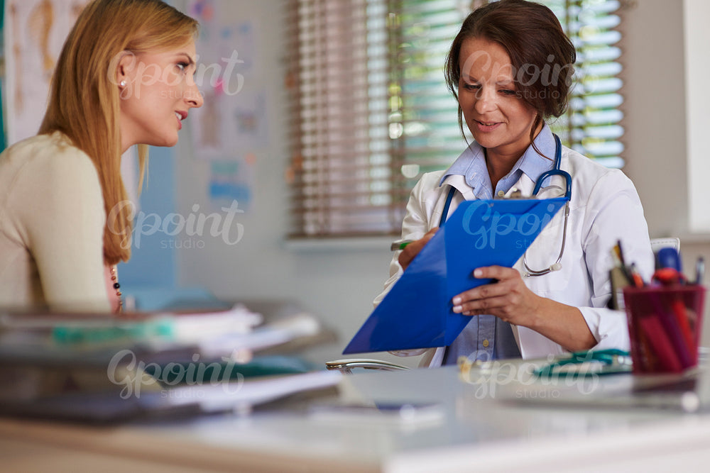 Doctor discussing test results with his patient