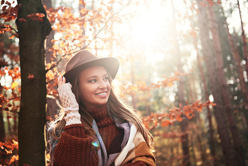 Beautiful woman in autumnal forest