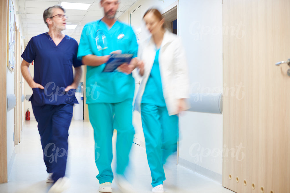 Doctors moving in blurred motion