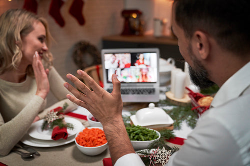 Video conversation with loved ones during a Christmas dinner