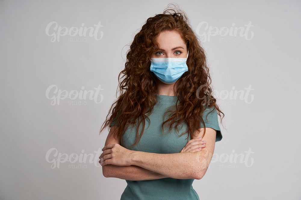 Portrait of beautiful woman in protective mask