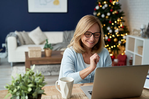 Mature woman during video conference over the holiday season