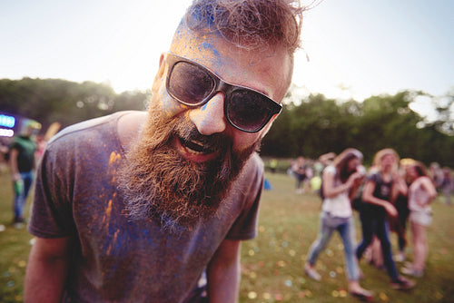 Portrait of man in holi colors