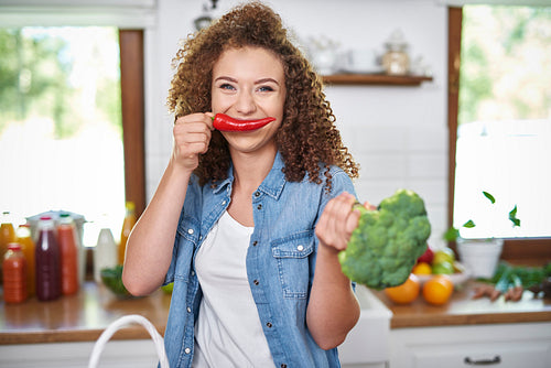 Woman with mustache of chili pepper
