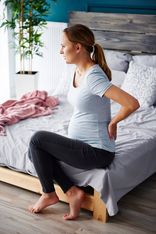 Pregnant woman suffering from back pain