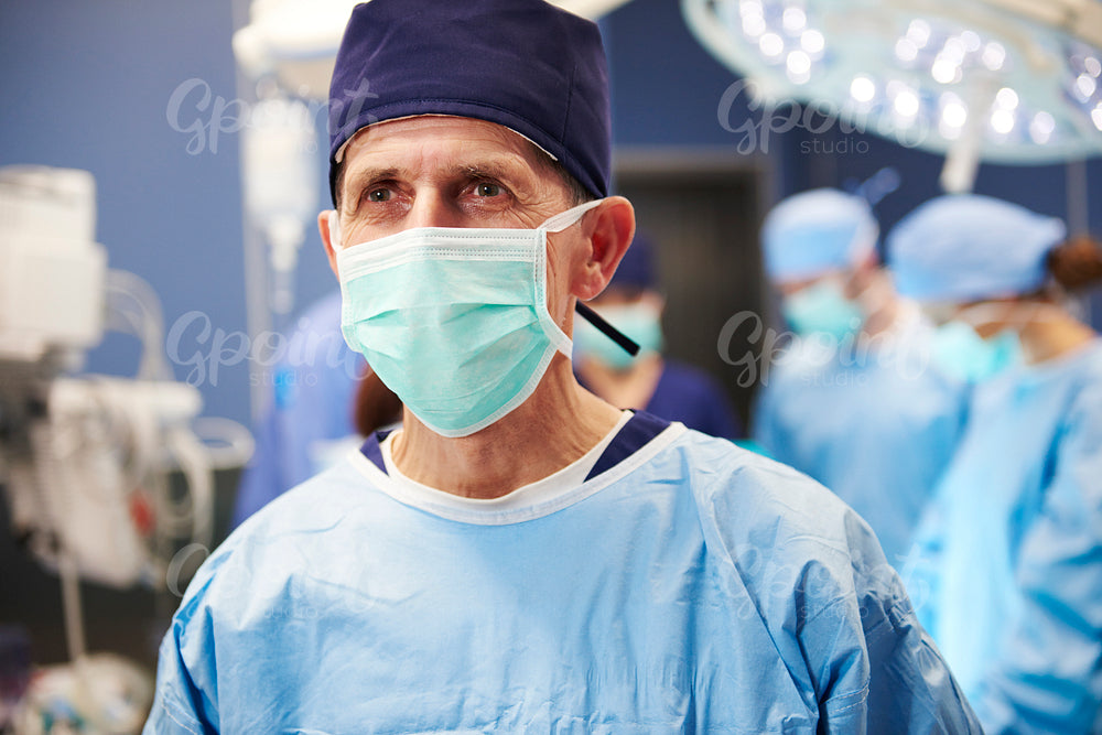 Portrait of senior surgeon ready for an operation