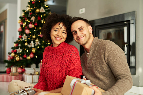 Portrait of affectionate couple ready for Christmas