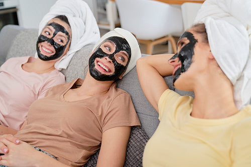 Three friend with face masks on faces