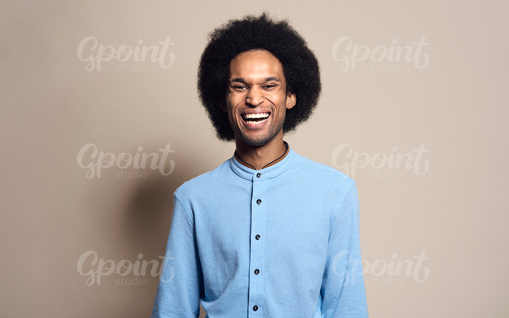 Portrait of happy mixed race man