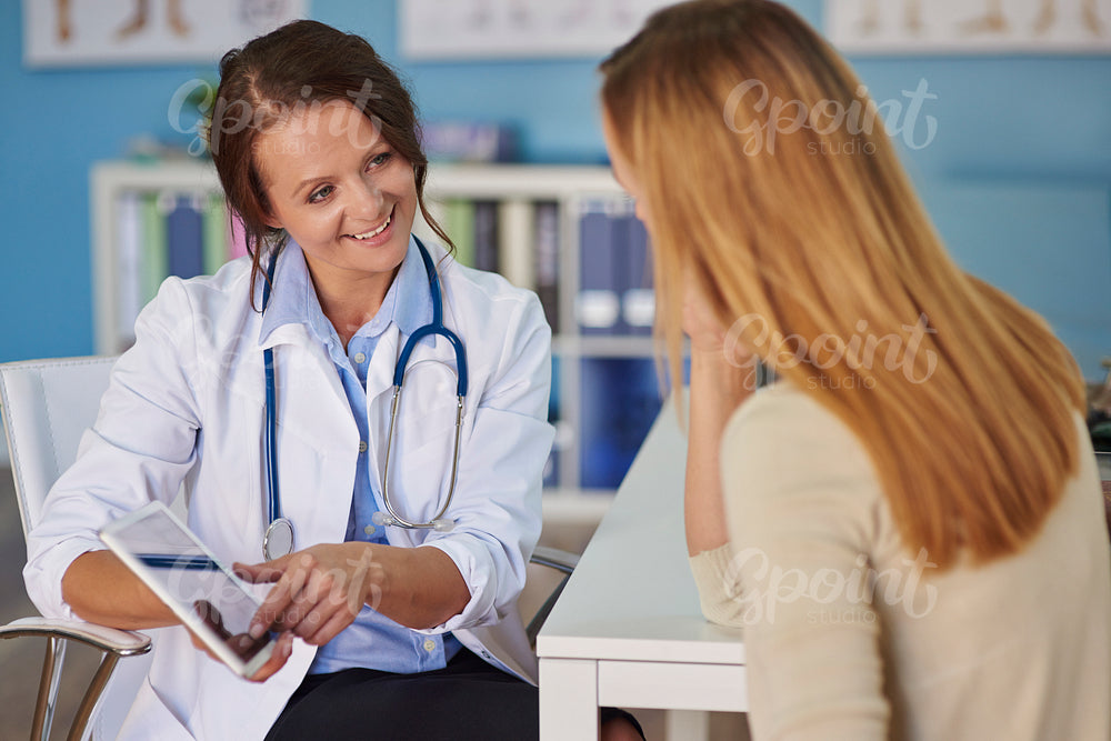Young woman paying a visit at the doctor