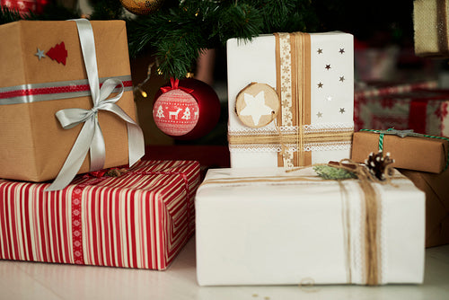 Close up of gifts under Christmas tree