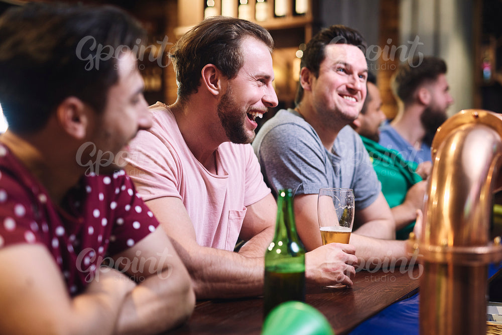 Group of men spending the weekend in the pub
